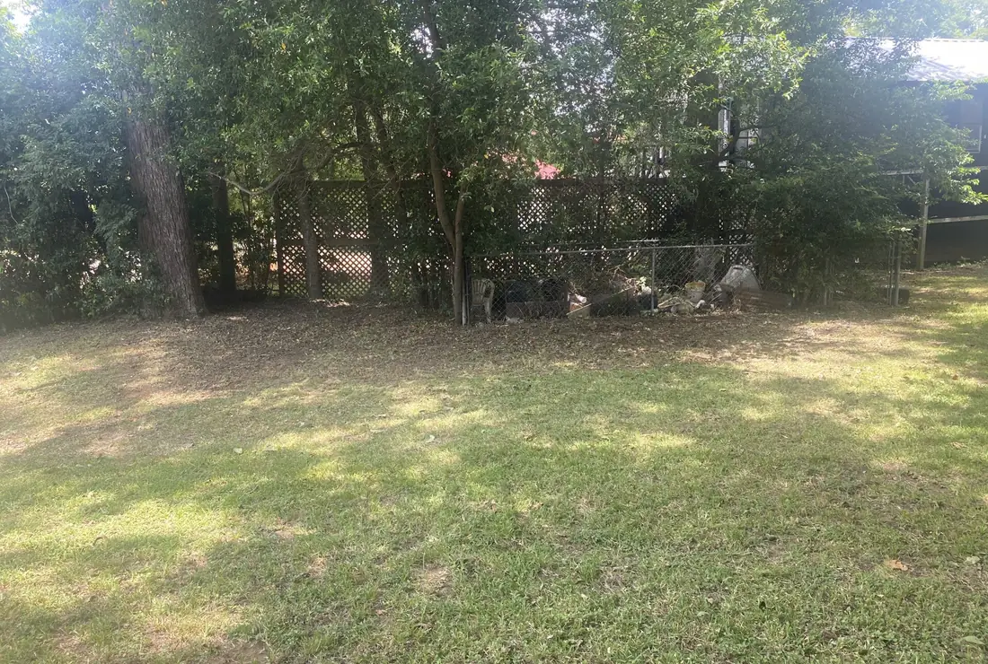 Large shaded property cleaned up and mowed